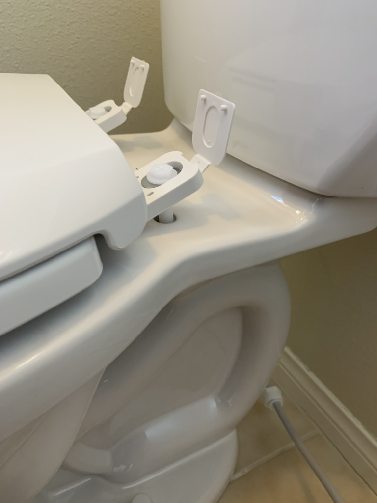 How to Install a Toilet - Place Toilet Seat on Base